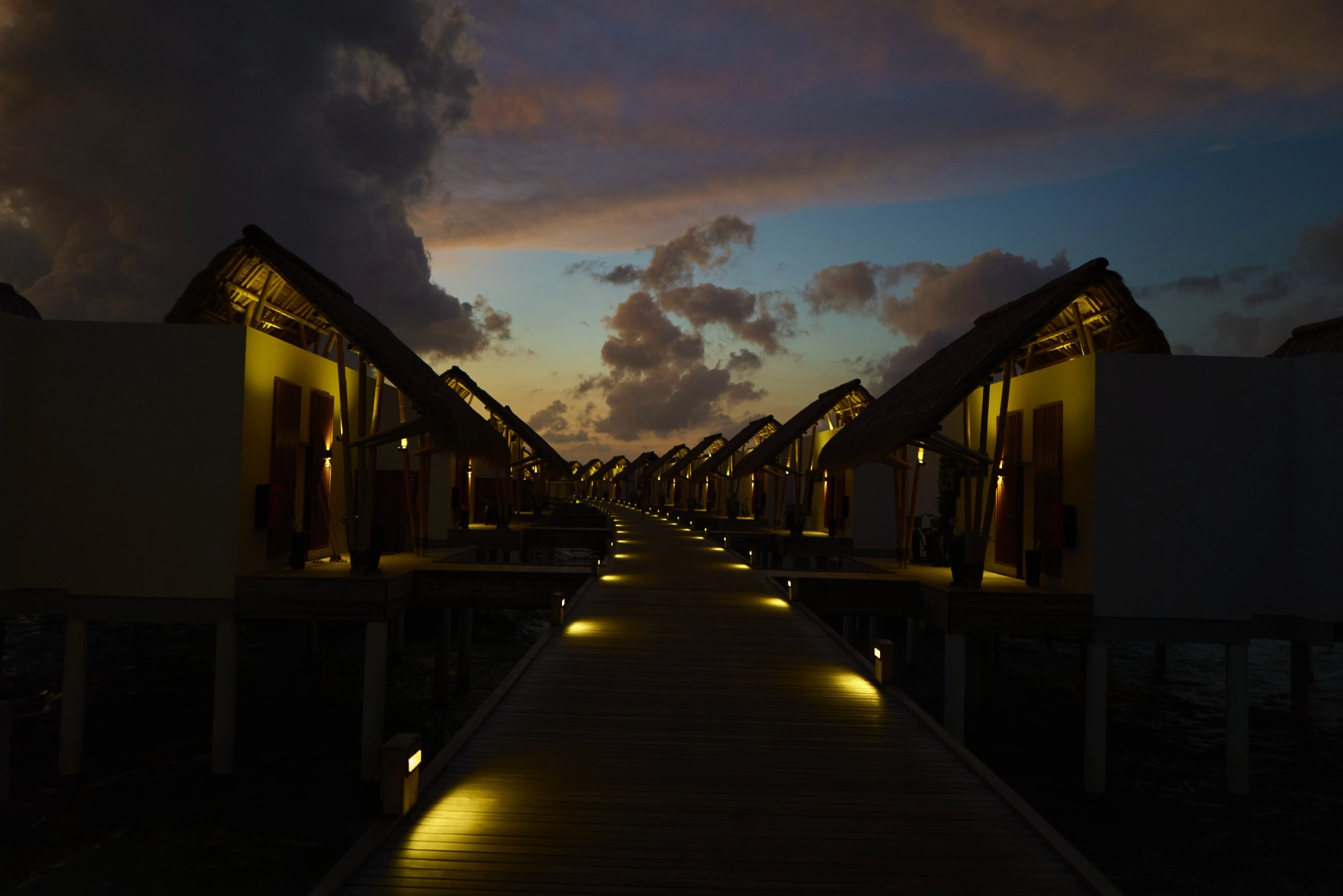 Corridor of overwater villas, Emerald Maldives Resort & Spa