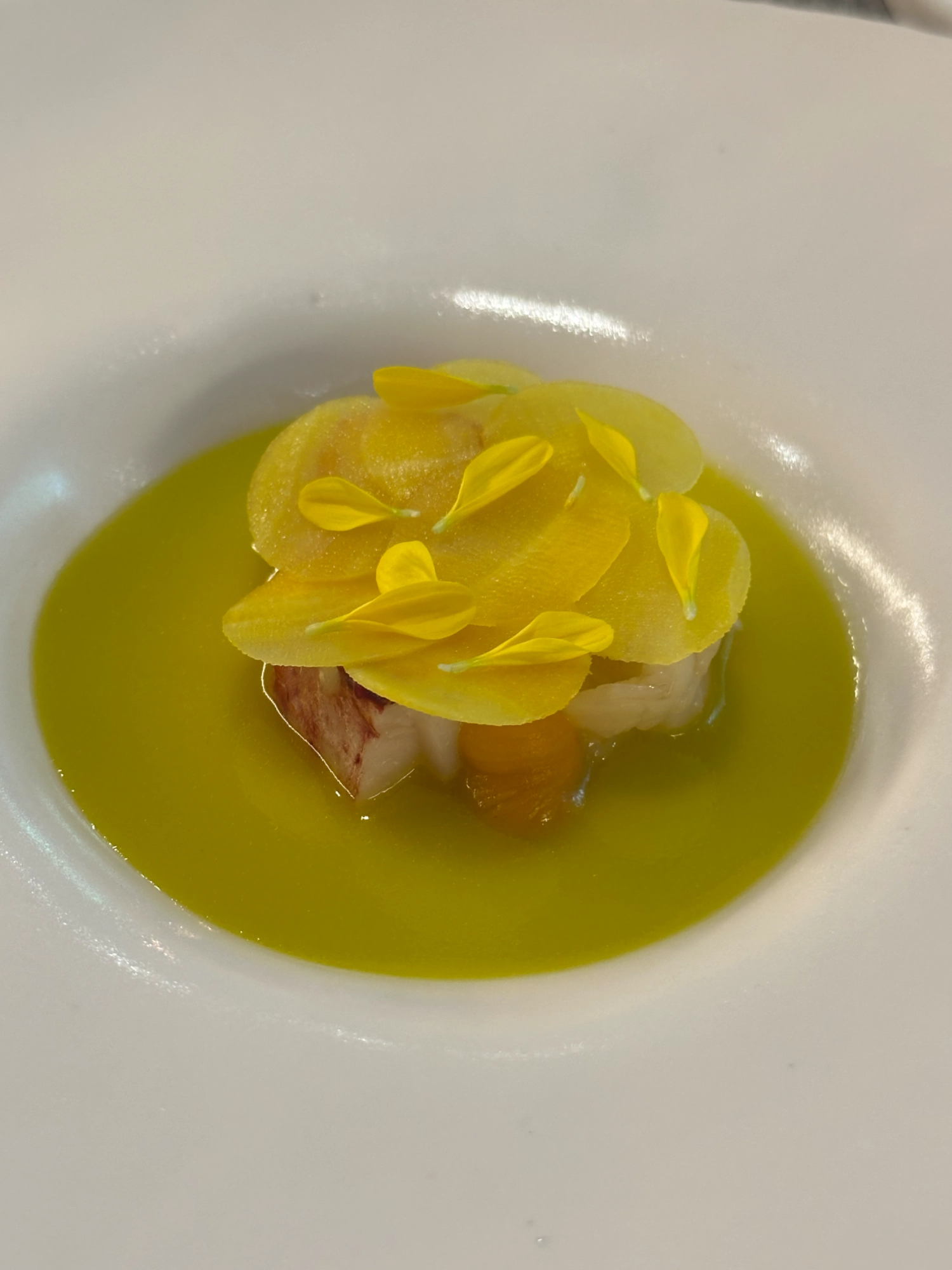 A signature dish of Gigas, lobster and seasonal vegetables.