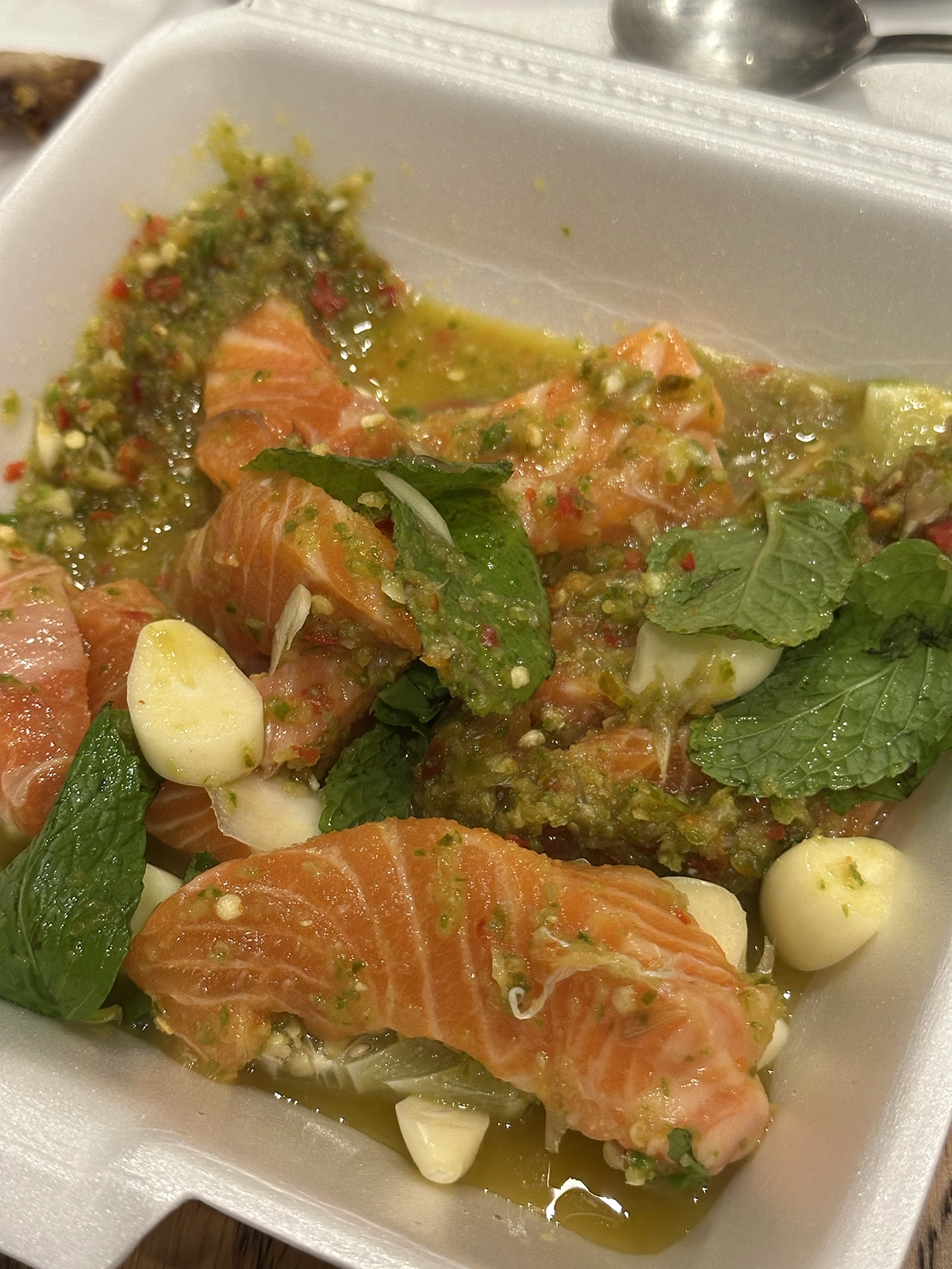 A salmon salad dish of Jeh O