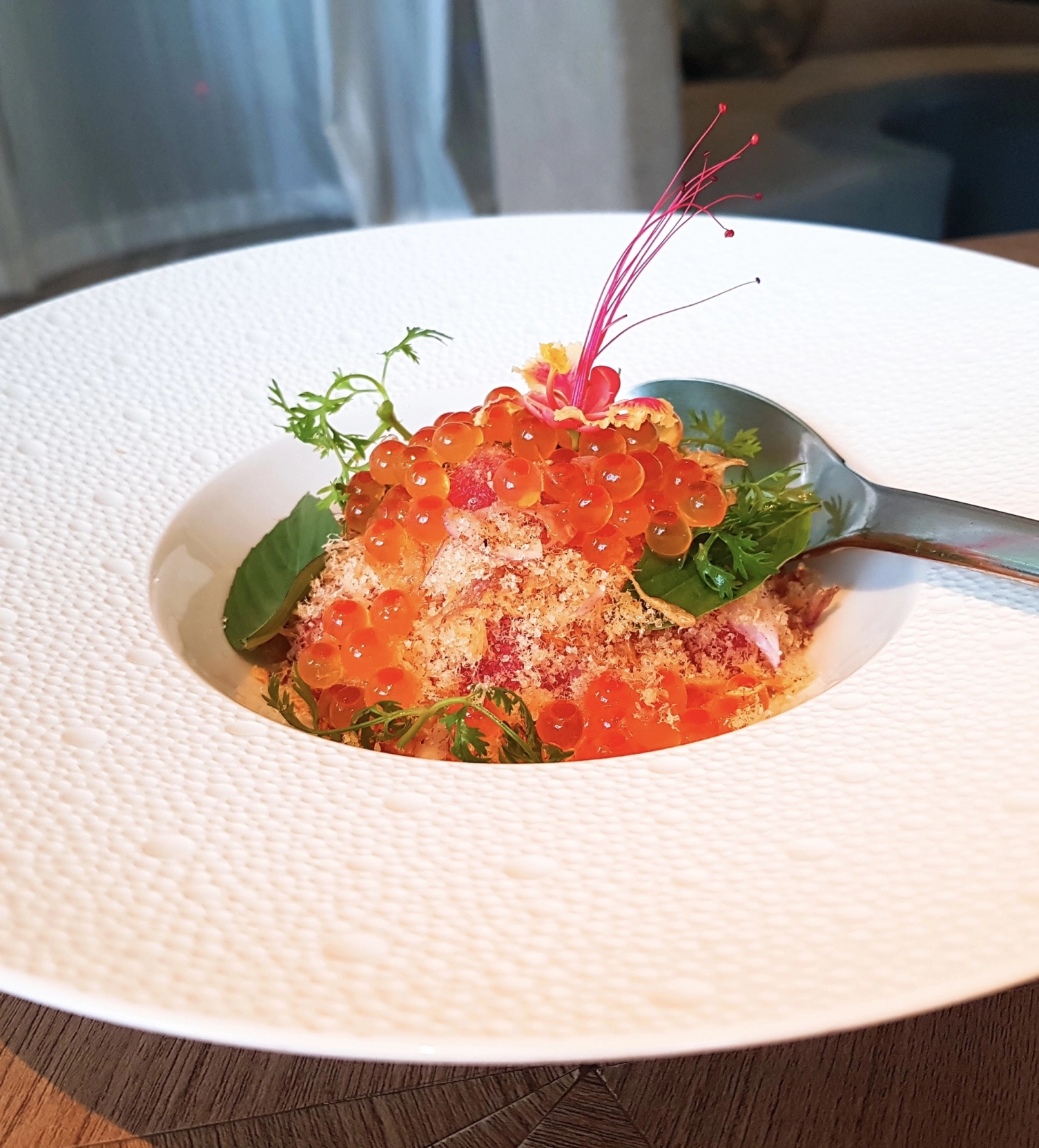 Watermelon and dried salmon, a signature dish of Paste