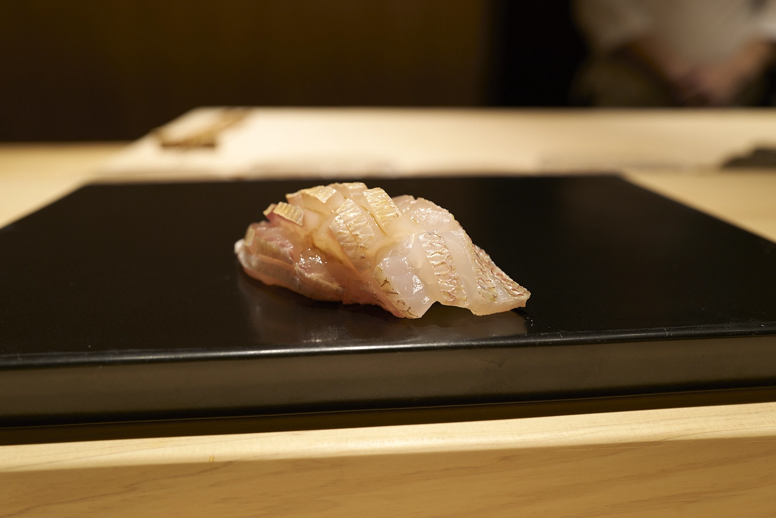 A piece of sushi from Shoukouwa